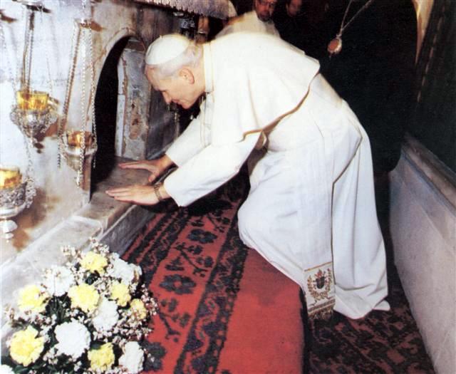 John Paul II praying at the relics of St. Nicholas